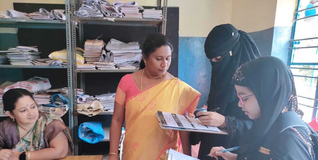 Student Activists explaining about GHMC services to Teachers of a School